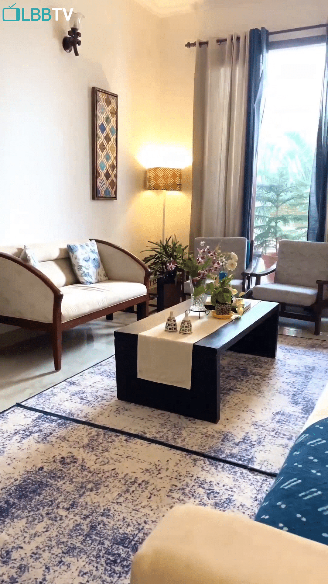 Table,Furniture,Couch,Comfort,Plant,Building,Azure,Picture frame,Wood,Textile