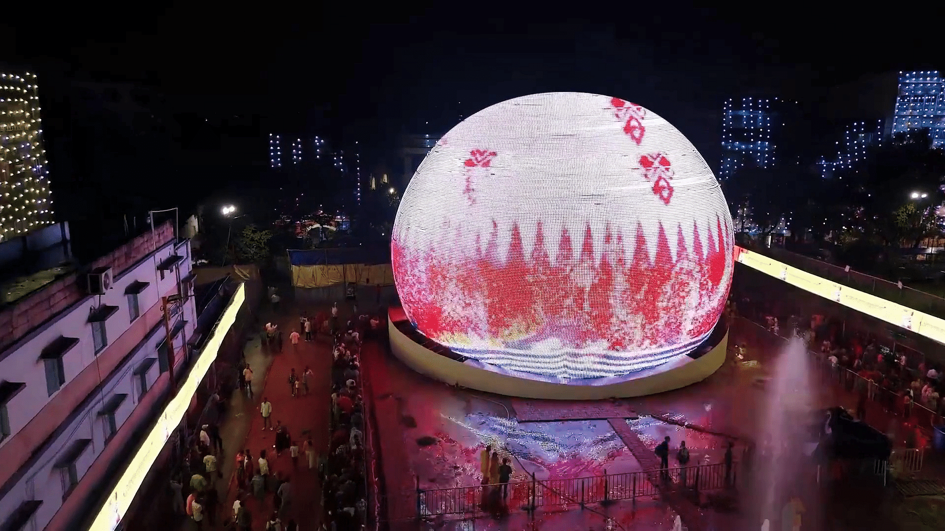 World,Sky,Building,Pink,Magenta,City,Circle,Event,Automotive lighting,Dome