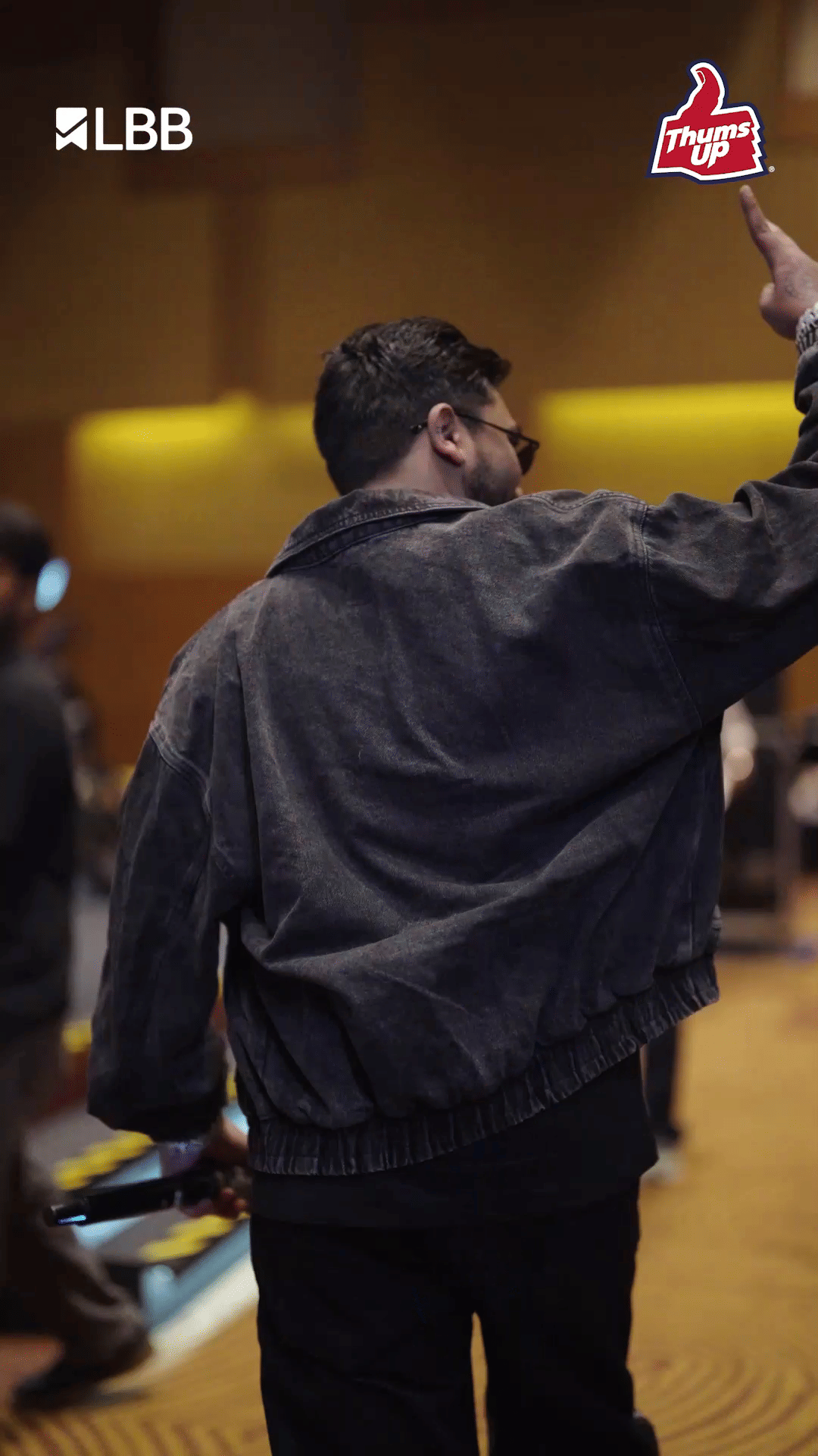 Outerwear,Jacket,Facial hair,Beard,Hoodie,Rapper,Performing Arts,Performance