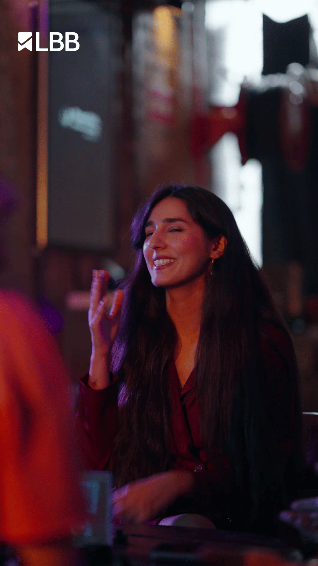 Facial expression,Smile,Happiness,Long hair,Fun,Layered hair,Fashion design,Party,Feathered hair,Night