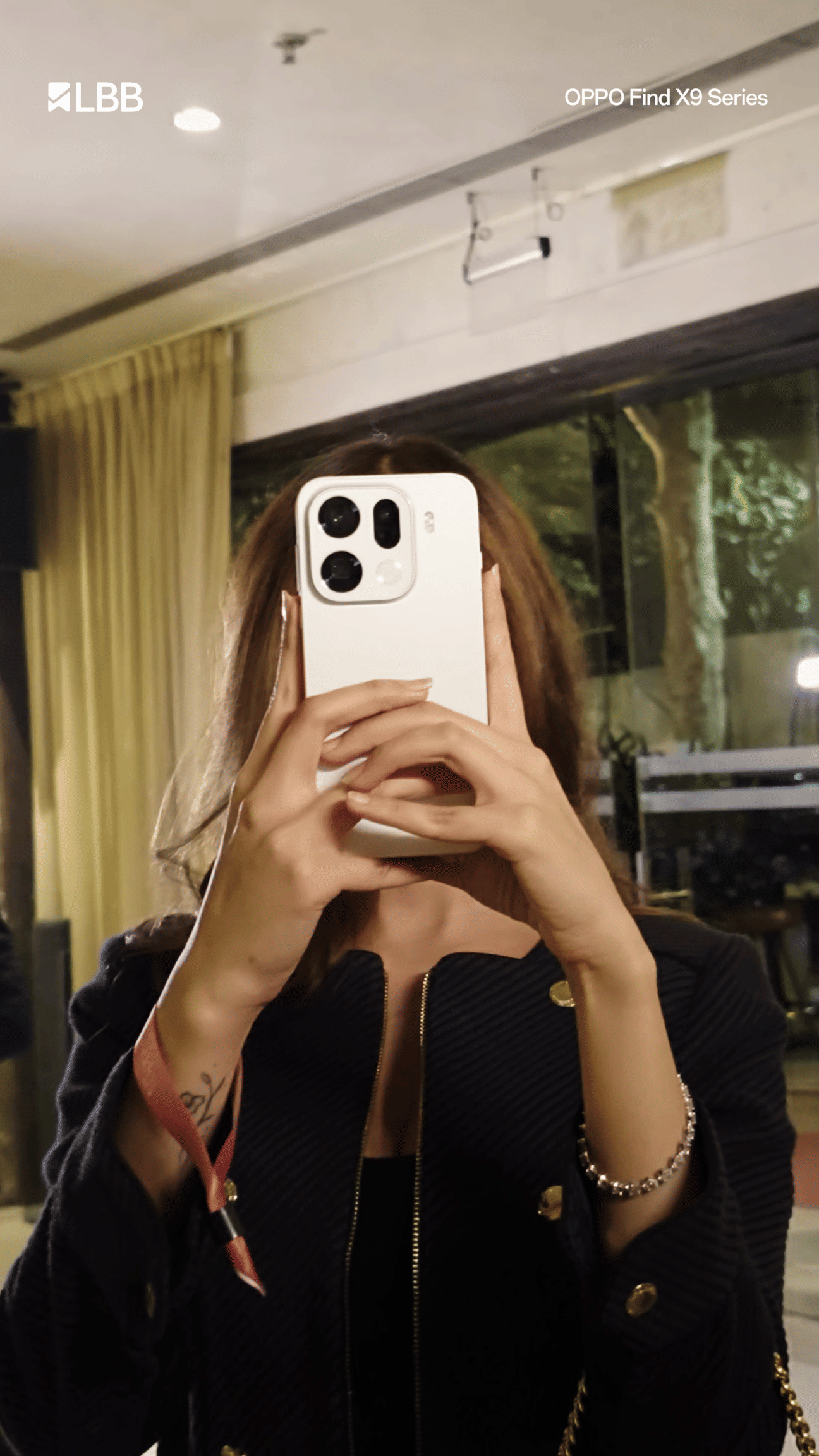 Fashion,Gadget,Wrist,Mobile phone,Blazer,Nail,Long hair,Portable communications device,Telephony,Communication Device