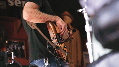 Artist playing guitar
